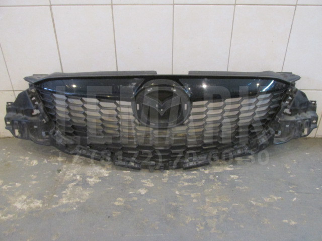 Решетка радиатора Mazda CX 5 2012> KD4550710E